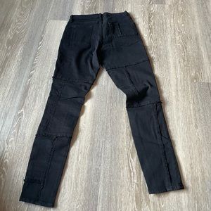 Black jeans with stitching patches
